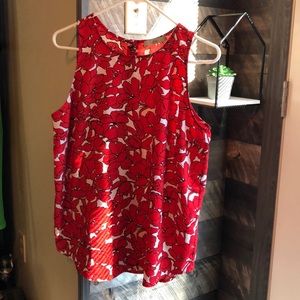 Red and white floral, sleeveless top.